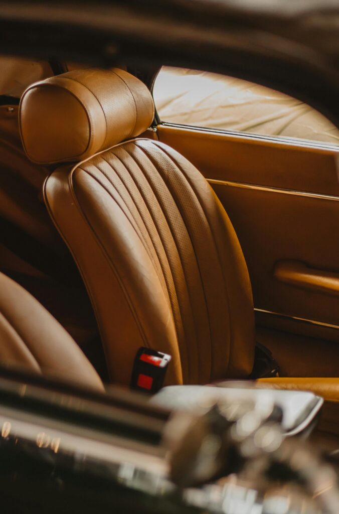 pexels photo 5507145 5507145 Luxurious tan leather car seat interior, exuding elegance and sophistication.